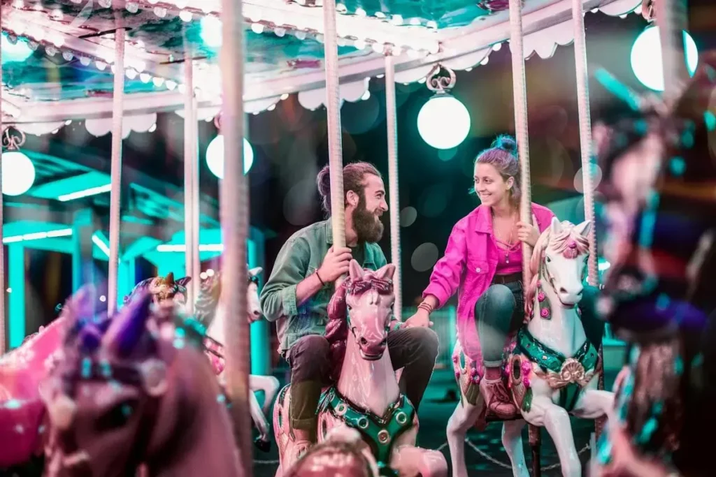 couple connecting on carousel