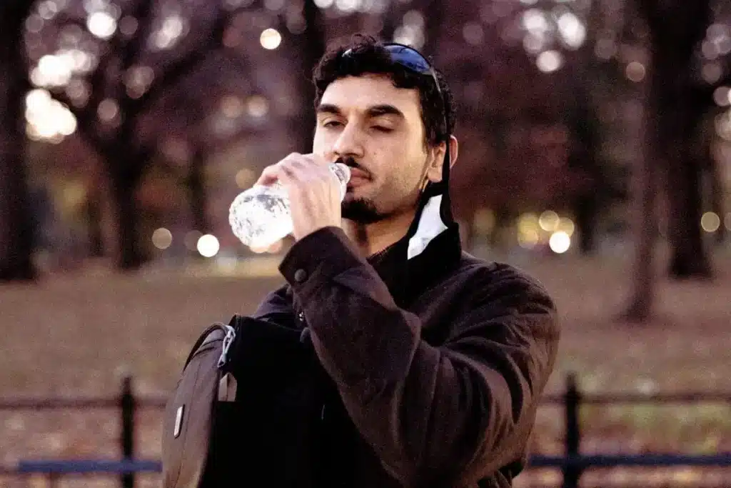 person drinking water morning