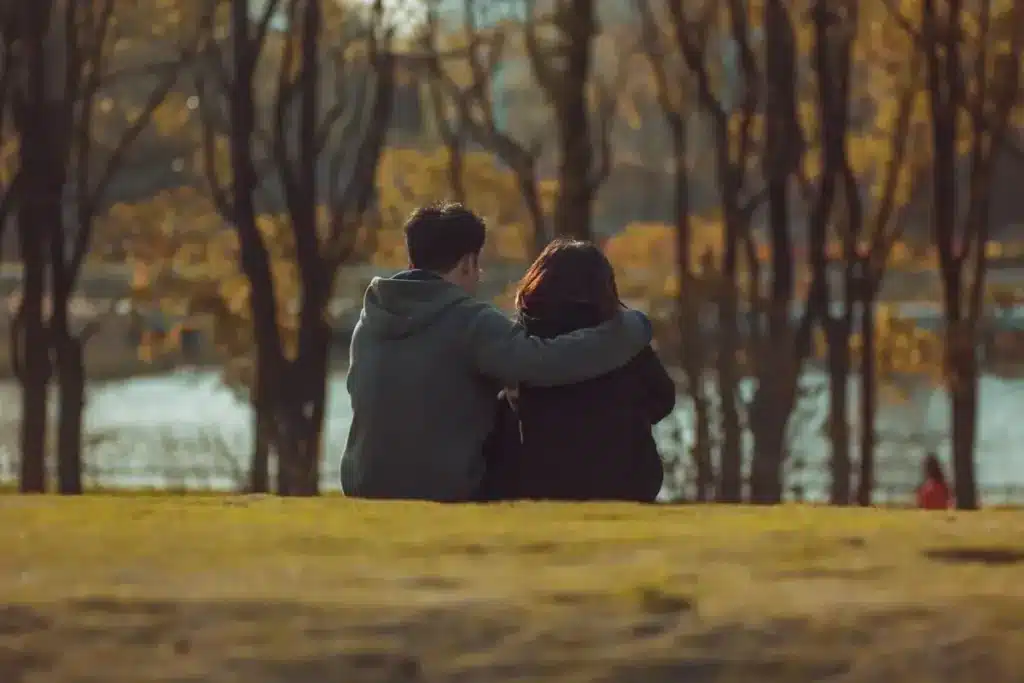 person comforting friend